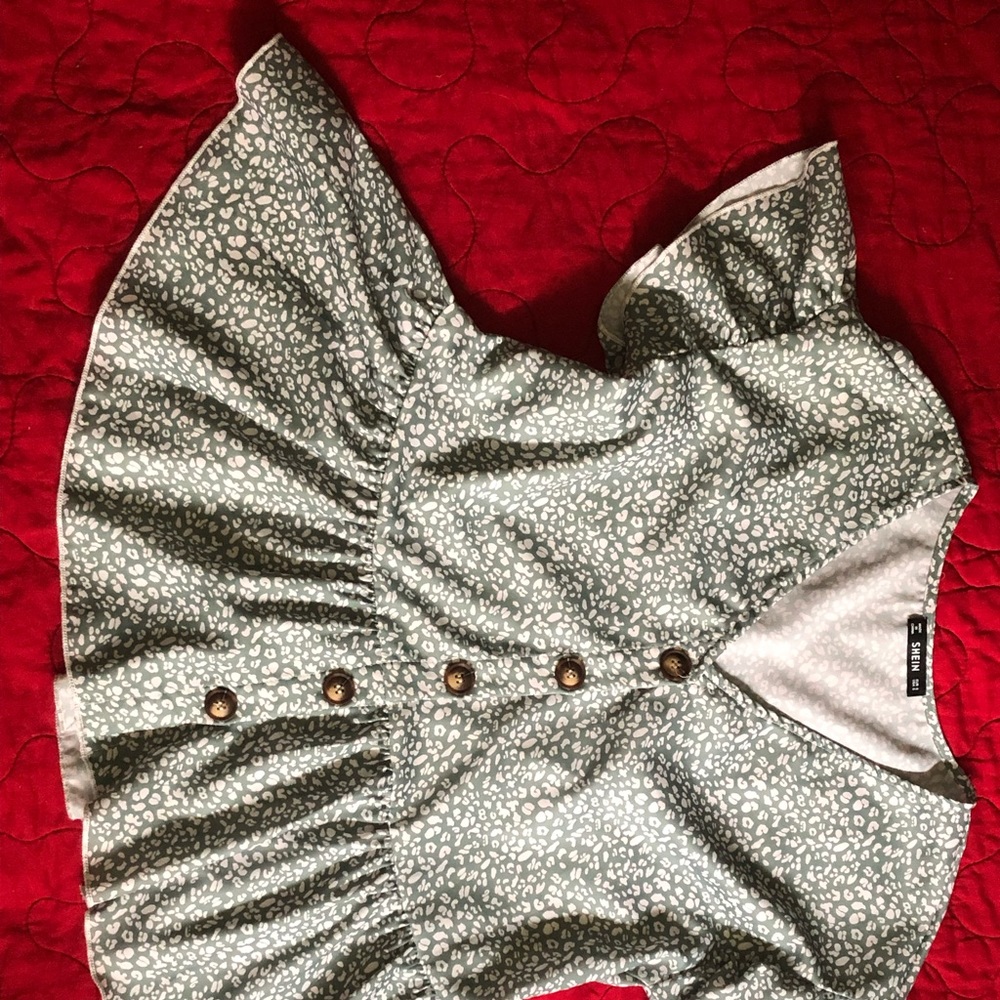 Leopard print ruffle trim top